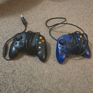 Black and Blue Gaming Controllers